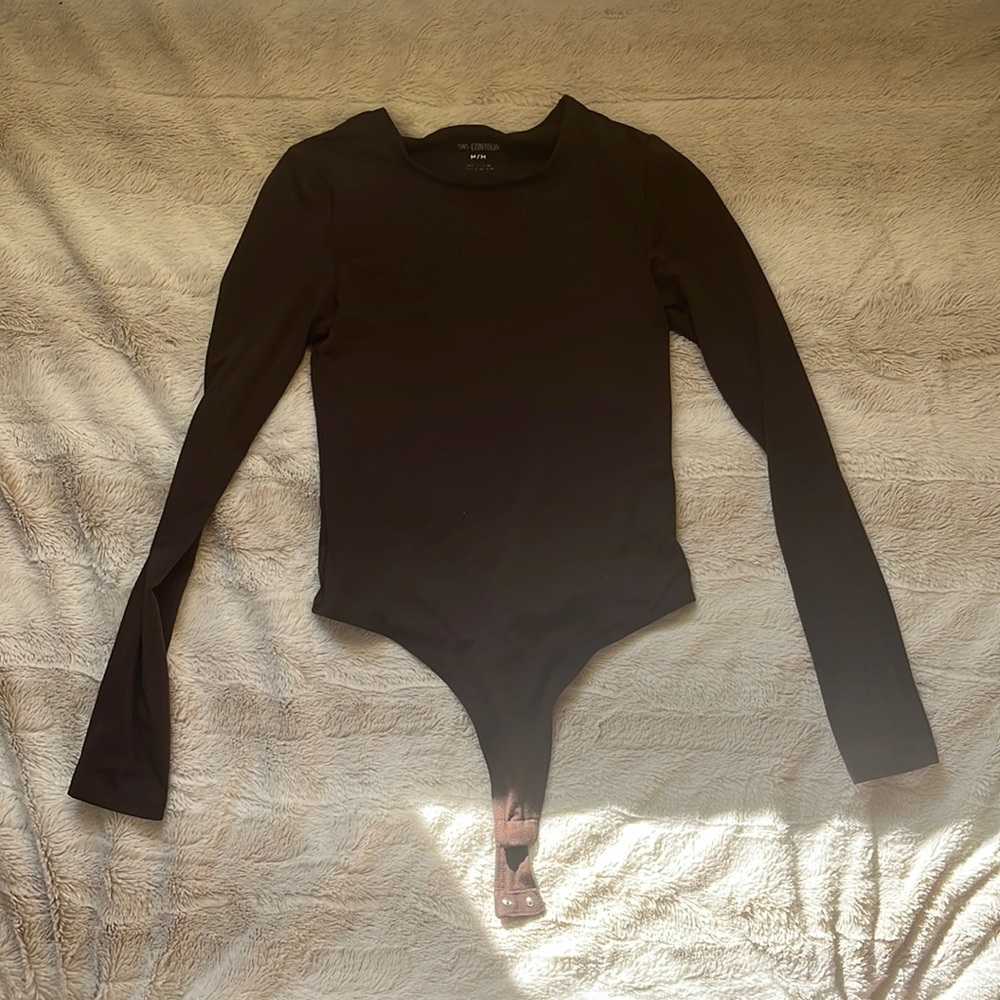 Brown one piece size M